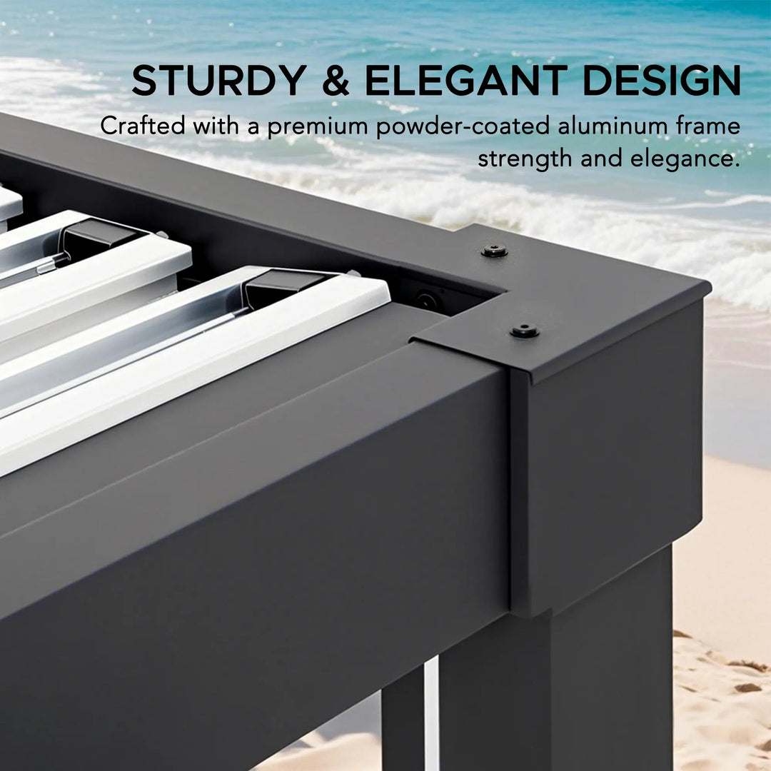 Black metal railing with text about sturdiness and elegance on a beach background