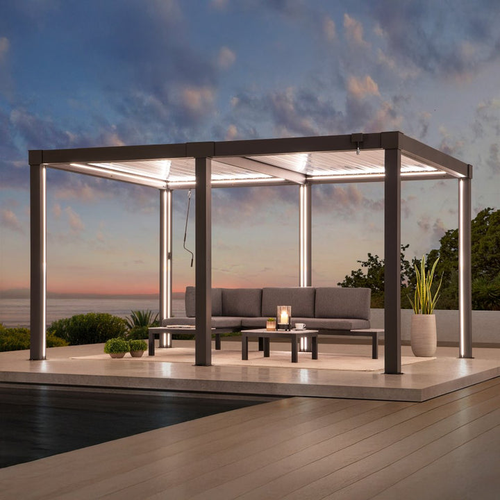 Outdoor patio with pergola, sofa, and table under a clear sky