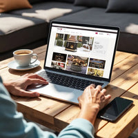 Using a laptop to browse Sunjoy on a wooden table