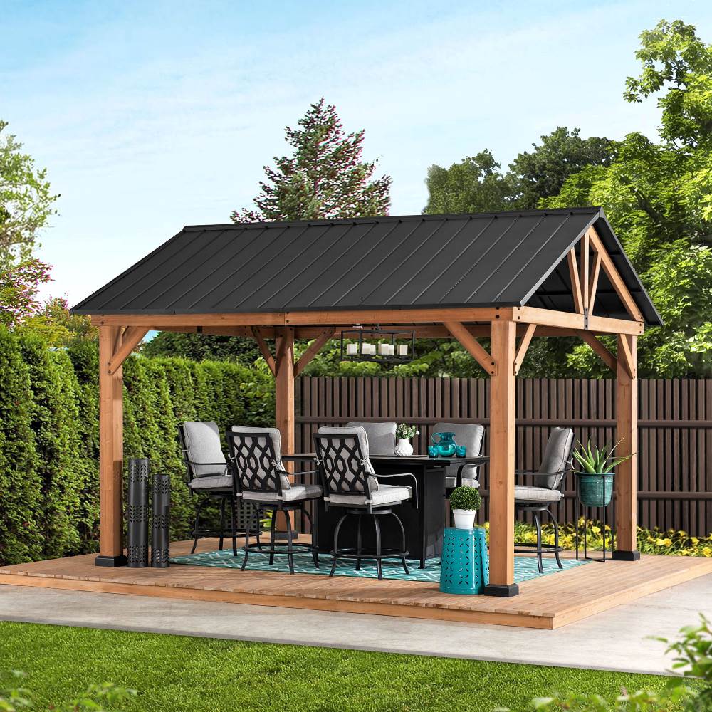 Wooden gazebo with black roof in a garden setting