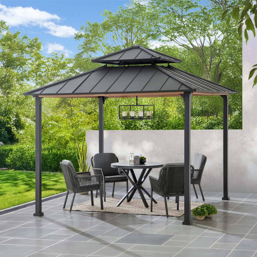 Patio gazebo with outdoor furniture on a tiled patio