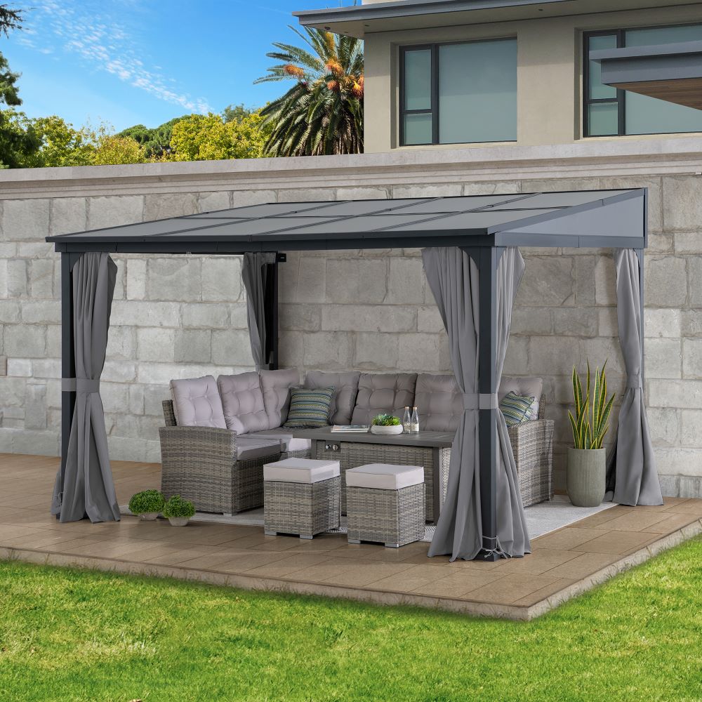 Outdoor patio with gray pergola, outdoor furniture, and plants on a sunny day.
