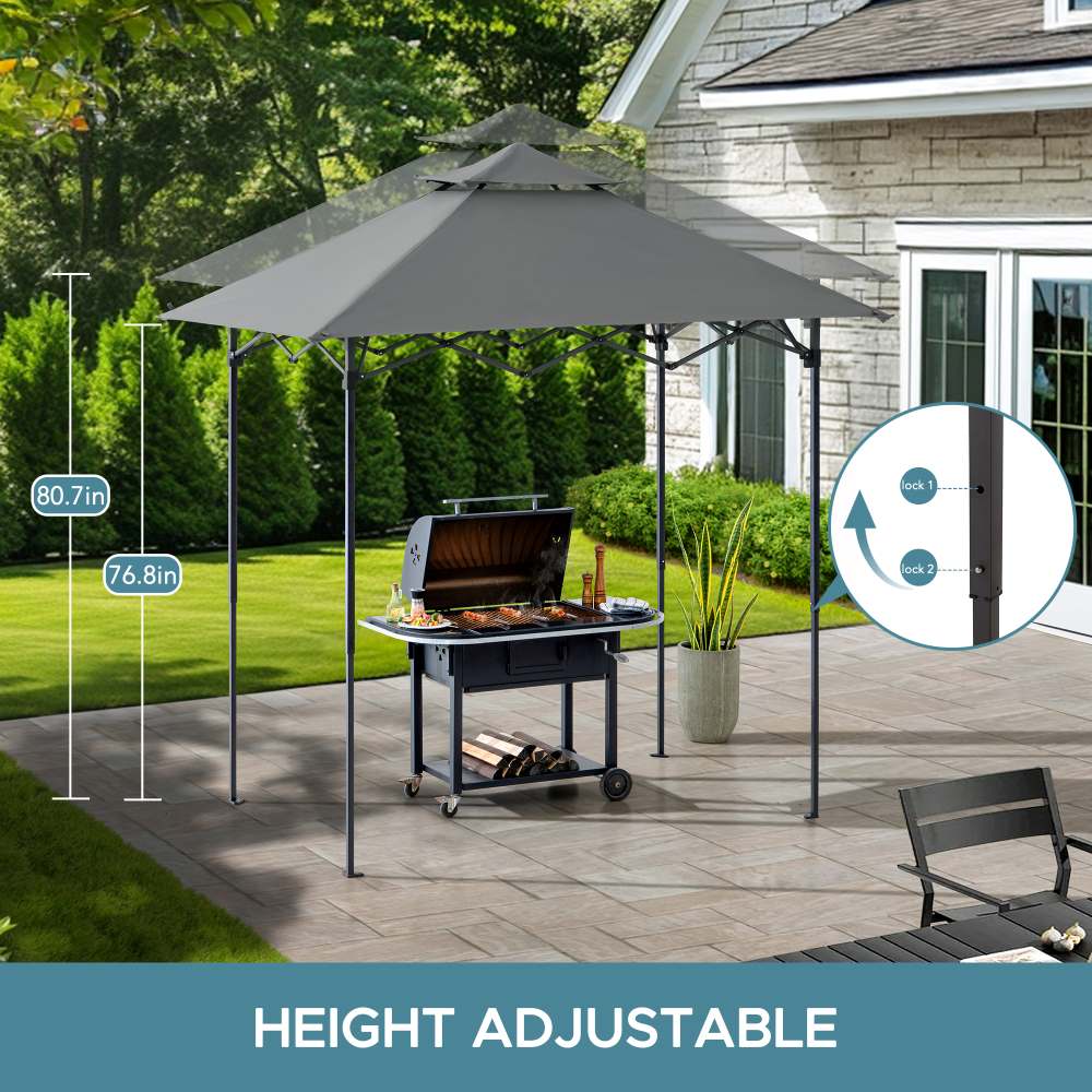 Outdoor umbrella with height adjustment feature over a grill on a patio