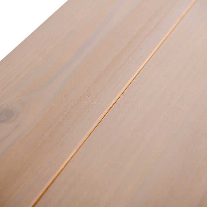 Close-up of a wooden surface with visible grain and texture