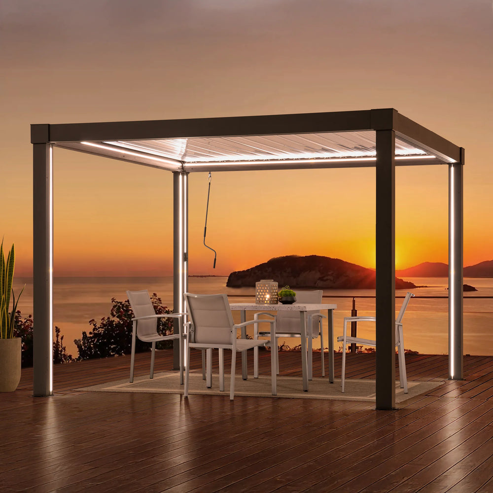 Outdoor dining area with a pergola overlooking a sunset over water
