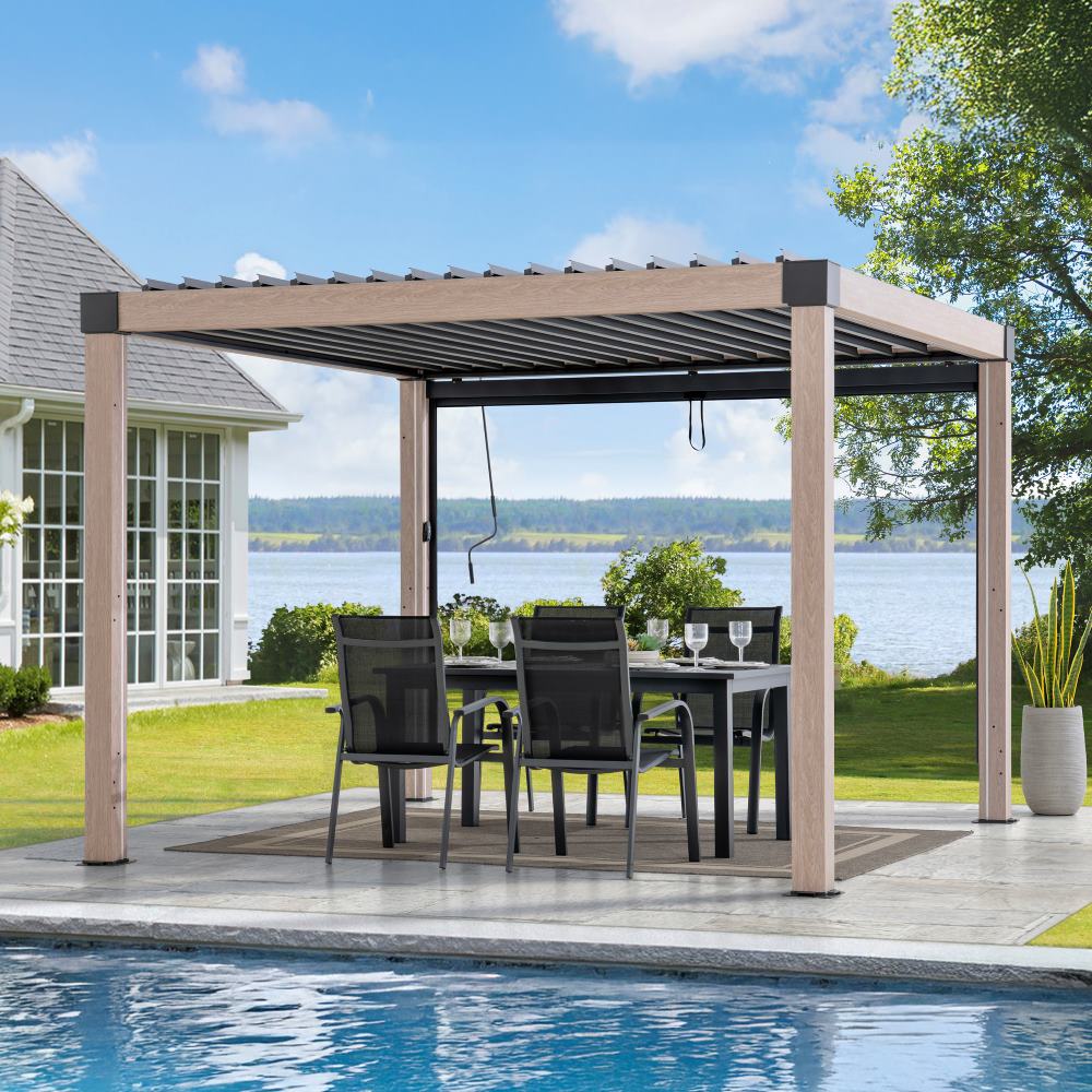Patio with pergola, dining table, and chairs by a poolside with a scenic view.