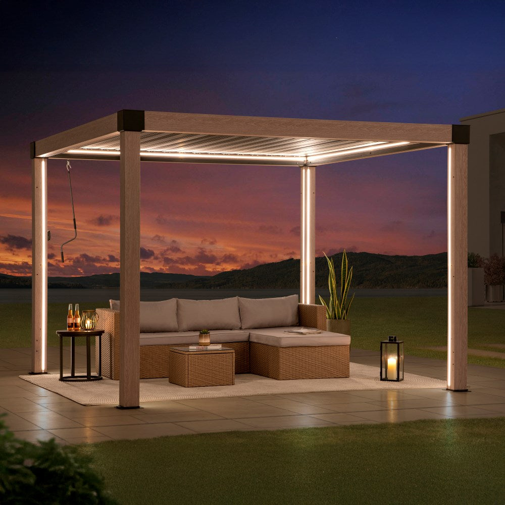 Outdoor patio with pergola, sofa, and table under a sunset sky