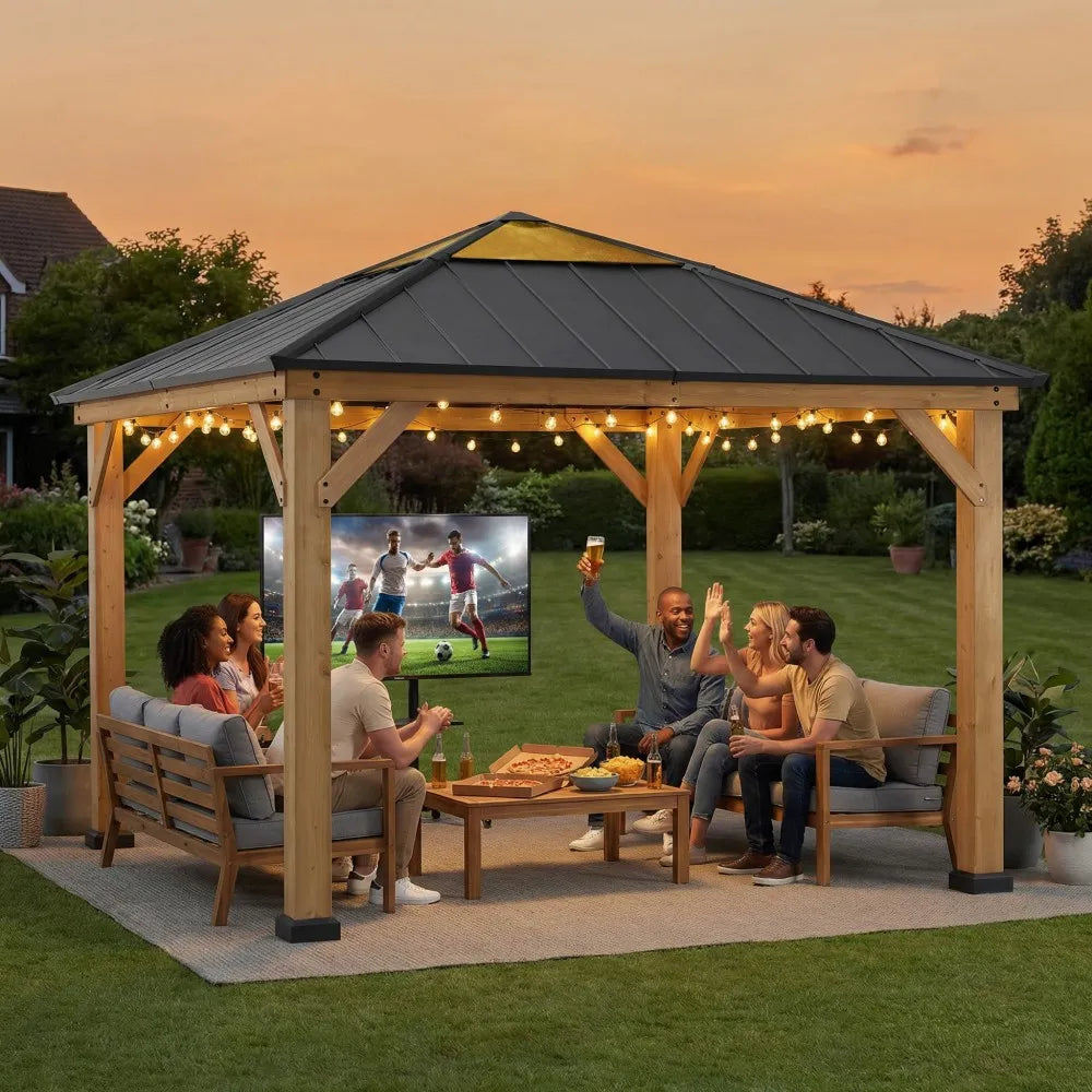 People watching a sports game on a screen in an outdoor gazebo with string lights.